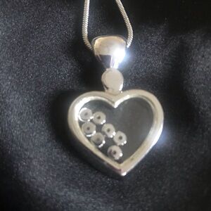 Silver Heart Pendant Necklace with Floating Discs